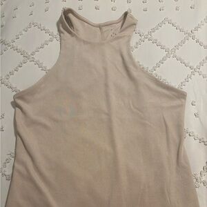 Cream colored tank, size M. Brand new, never worn.